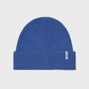 un bonnet en laine d'agneau bleu jean Billybelt, vue de face sur fond blanc
