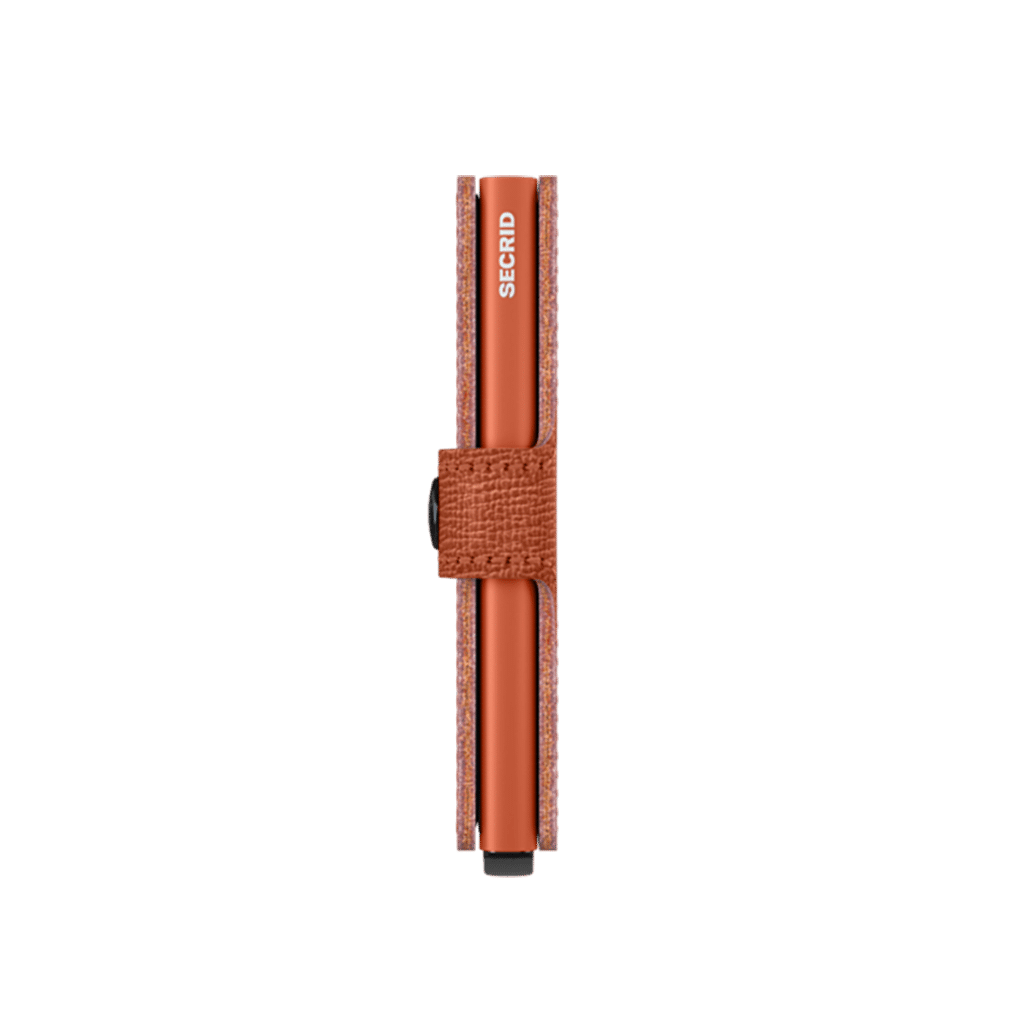 Miniwallet Crisple Pumpkin : Élégance et Compacité, Secrid, vue de côté sur fond blanc