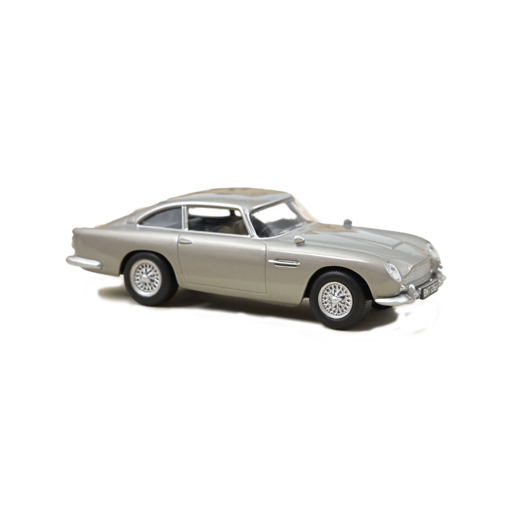 Une voiture minimaliste à échelle 1/43 - Aston Martin DB5 1/43 Gris – Norev : une miniature de légende - Vue de face sur fond blanc